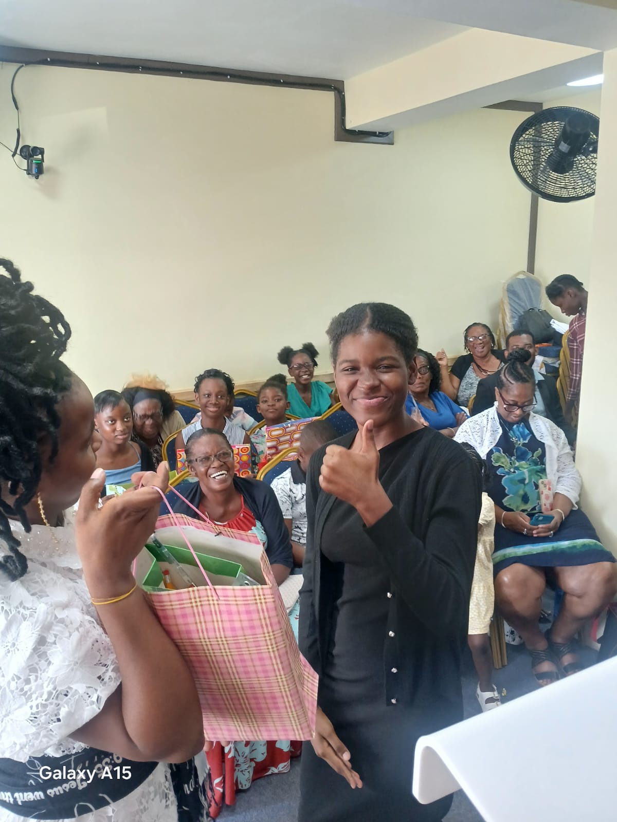 Church member smiling after receiving a gift